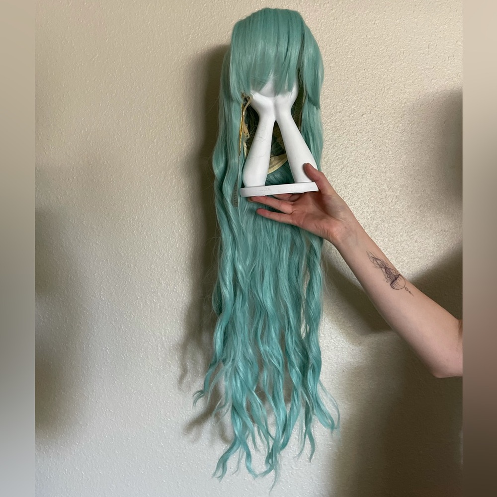 Pastel teal cosplay long haired wig